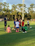 Ray Gomes coaching soccer