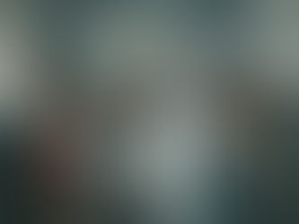 A textured oil painting depicting a diverse group of eight individuals standing in a dimly lit hospital corridor, reminiscent of David Rosenhan’s experiment. The central figure, an older man in a white lab coat with a red tie, stands confidently, surrounded by a painter in a red shirt, a housewife with arms crossed, a pediatrician, a psychiatrist, three psychologists, and Rosenhan himself. The background features walls covered with handwritten notes and diagrams, some circled in red, with a soft yellow light overhead. The scene captures a tense, contemplative mood, blending realism with a cinematic atmosphere.13s