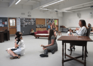 The cast rehearses a scene in the acting lab. By Hae June Lee