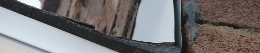 Damaged roof flashing on brick home, 2020/07/19