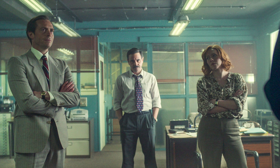 Stephen Campbell Moore, Emun Elliott and Charlotte Spencer enjoying their time in the office.