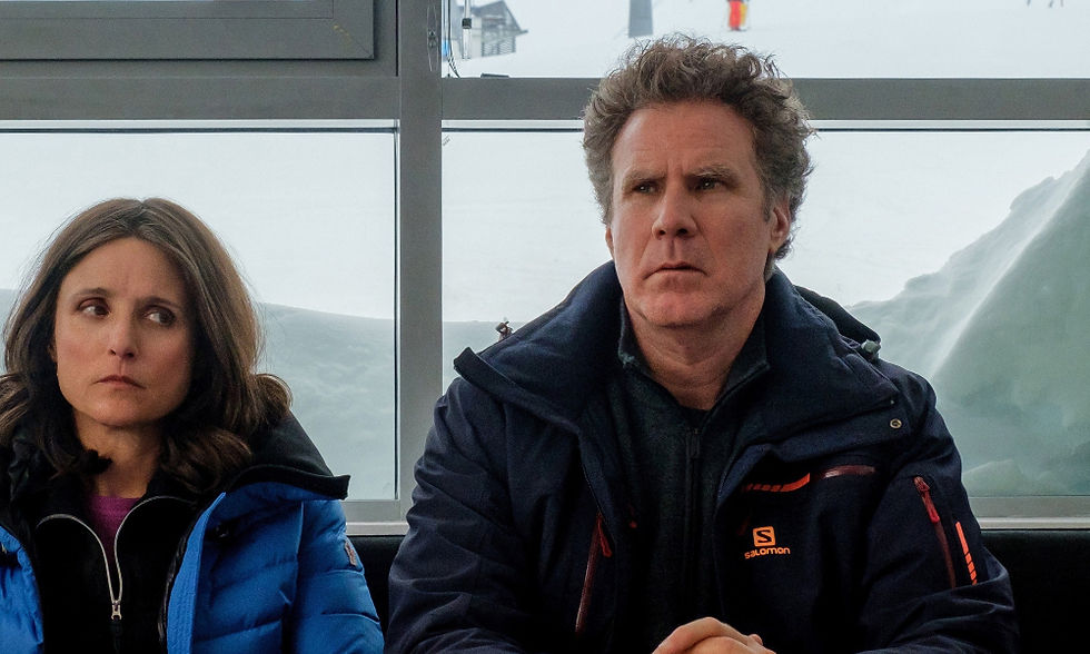 Julia Louis-Dreyfus and Will Ferrell wearing winter clothes
