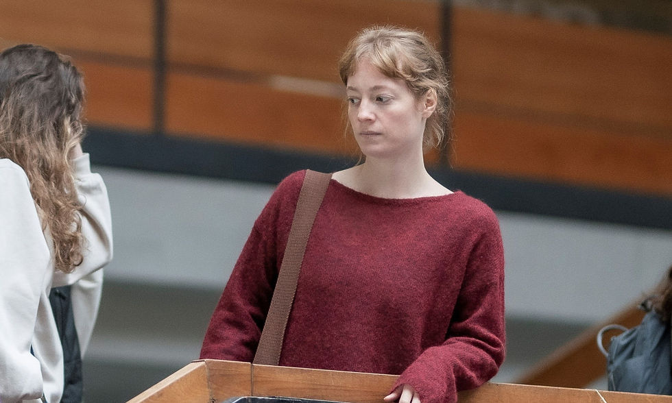 Leonie Benesch standing on stairs