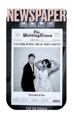 A couple posing on a newspaper photo booth