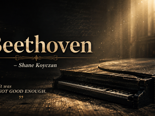 A legless grand piano on a wooden floor under a spotlight, illustrating the Beethoven Shane Koyczan analysis study guide.