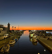 Molo di Viareggio, vista dalla passerella con tramonto e colori caldi