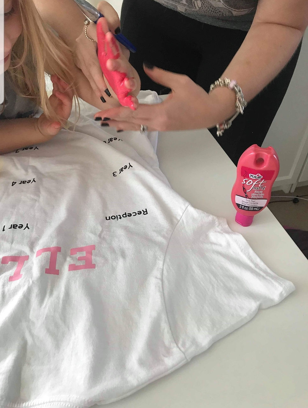 Thumbnail: T shirt being worked on