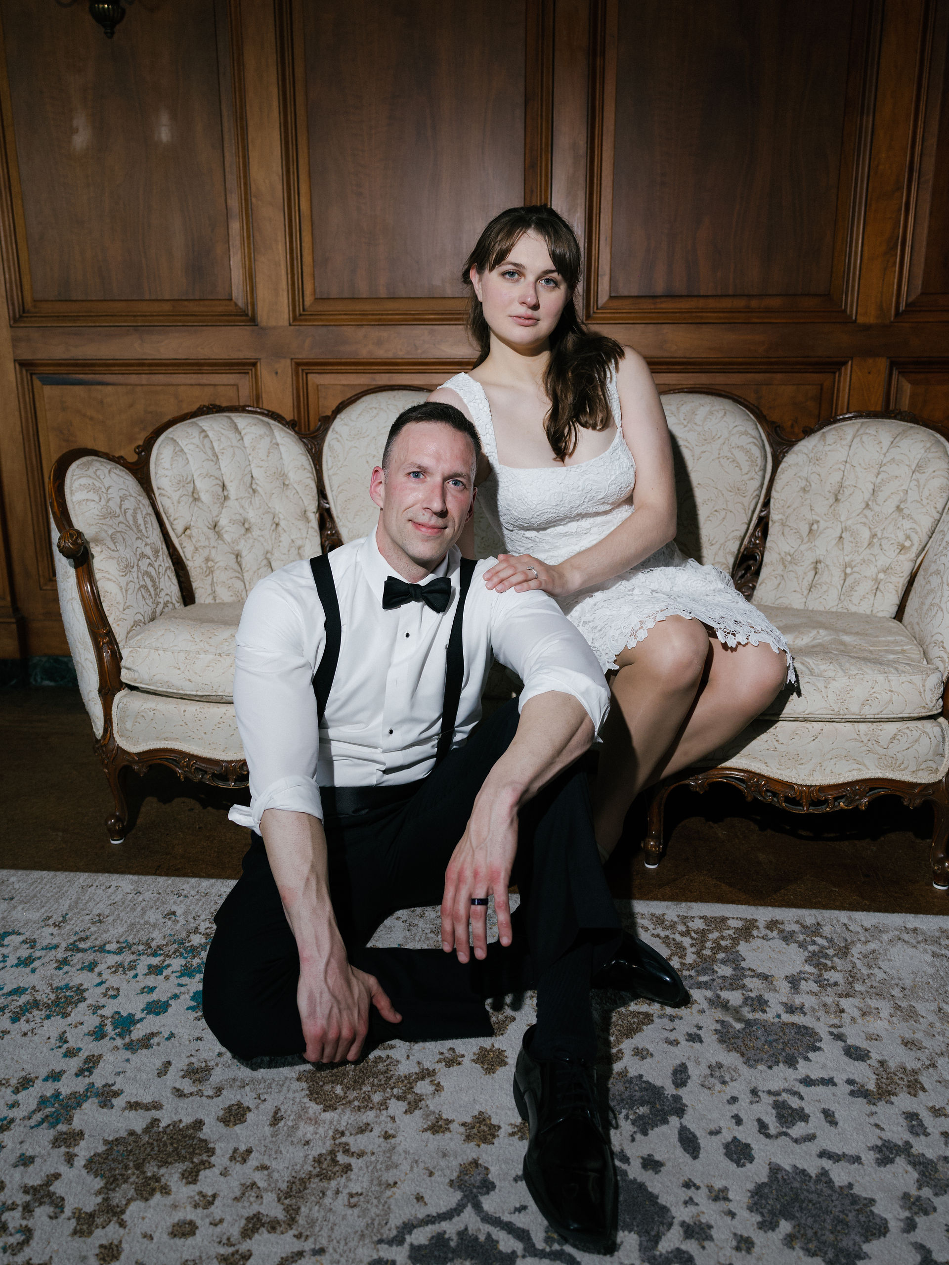 The bride and groom strike an editorial pose