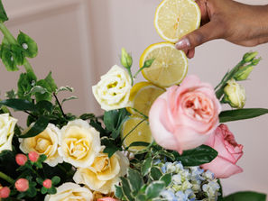 A bouquet of flowers with lemons
