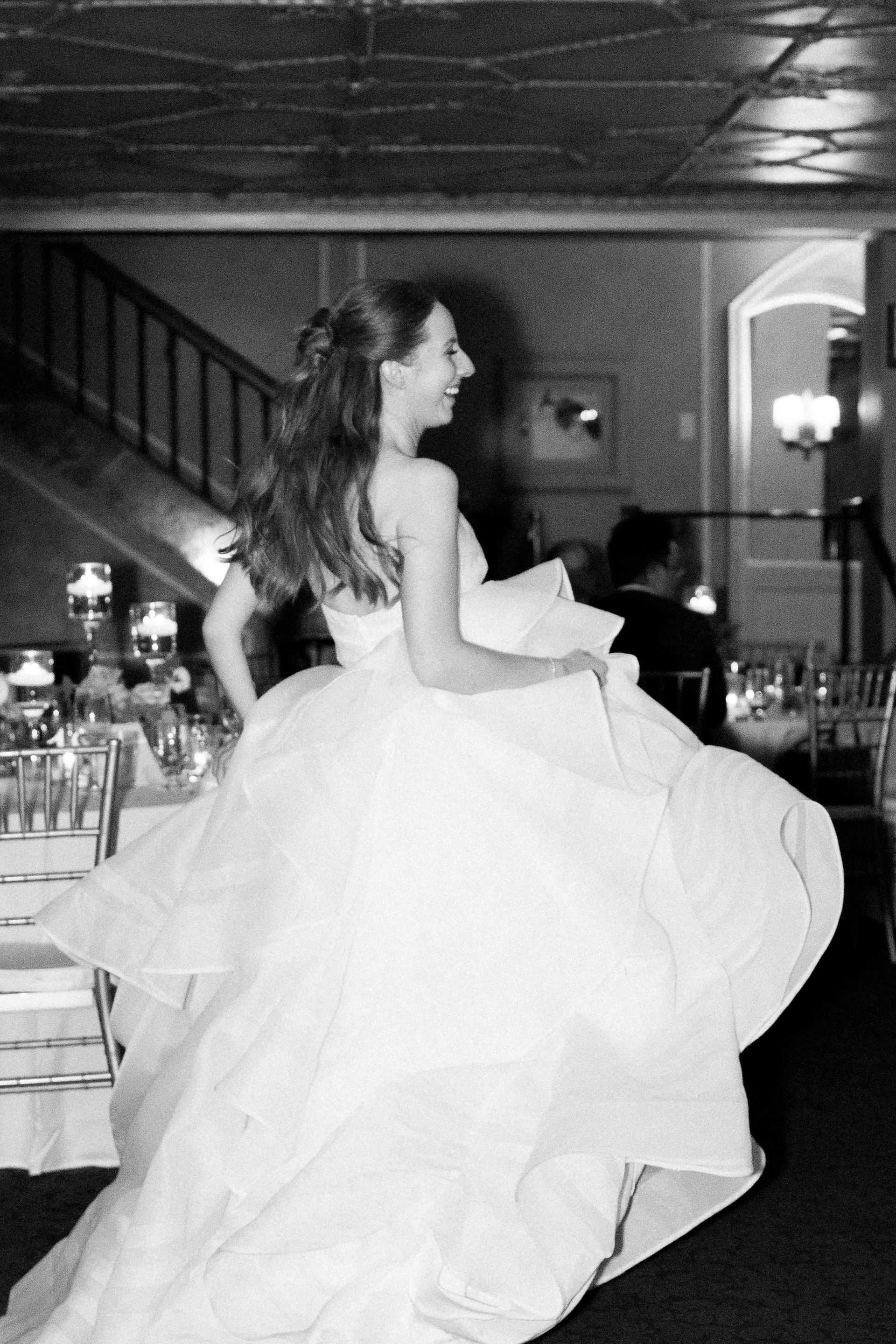 Bride running through Detroit Opera House