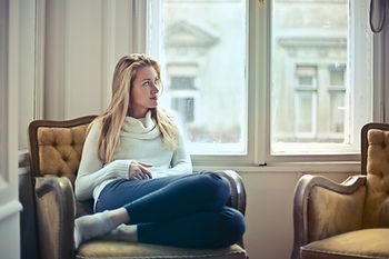 Woman thinking about a mortgage