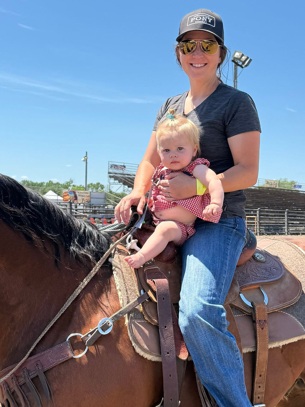 Camarie Roorda (author & PPC Owner) and her daughter Wylie at the ProRodeo in Buffalo, MN.