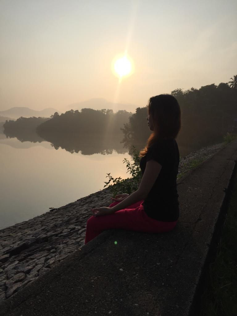 sitting lake back sunrise kerala3.jpg