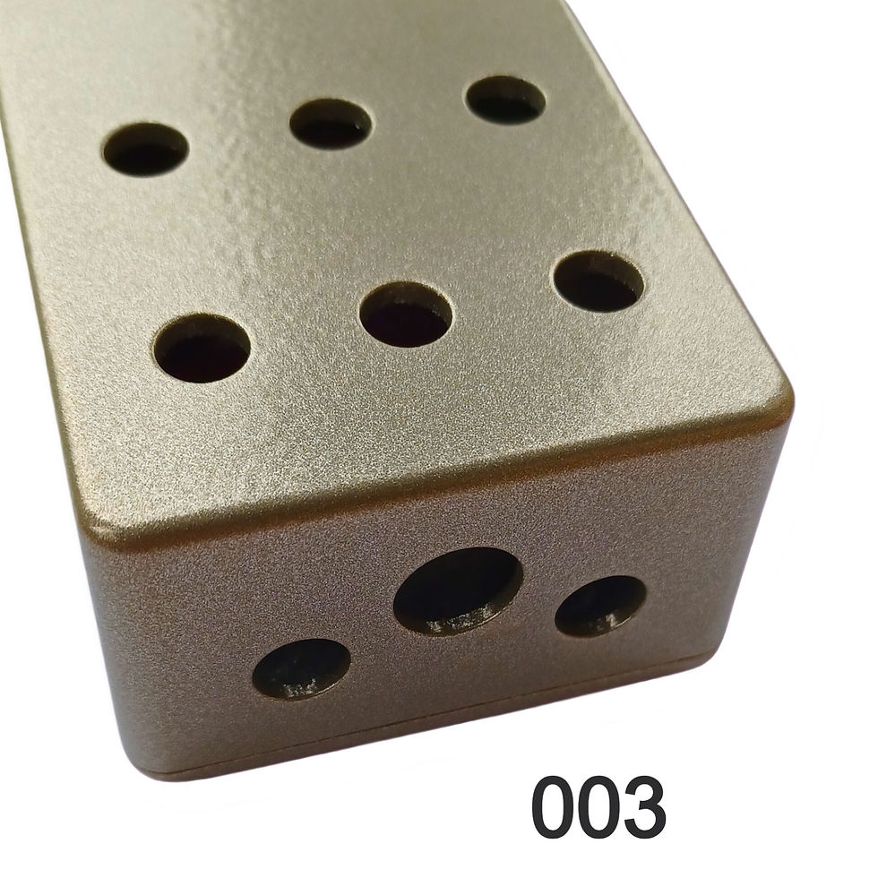 Thumbnail: top view of gold coloured painted guitar pedal enclosure with drilling