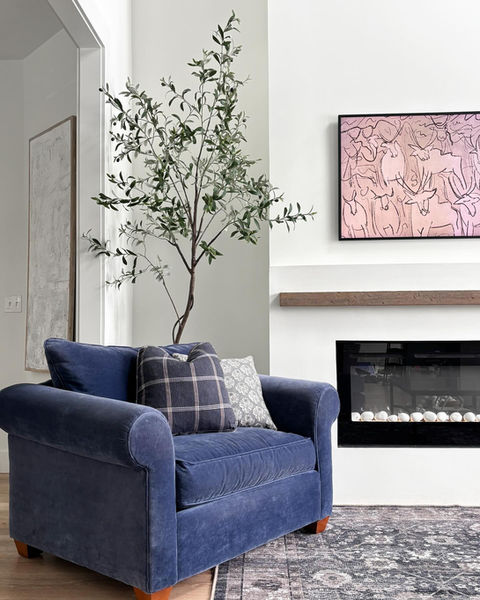 Modern organic residential living room interior design by House of You Interior Design in Newaygo, MI