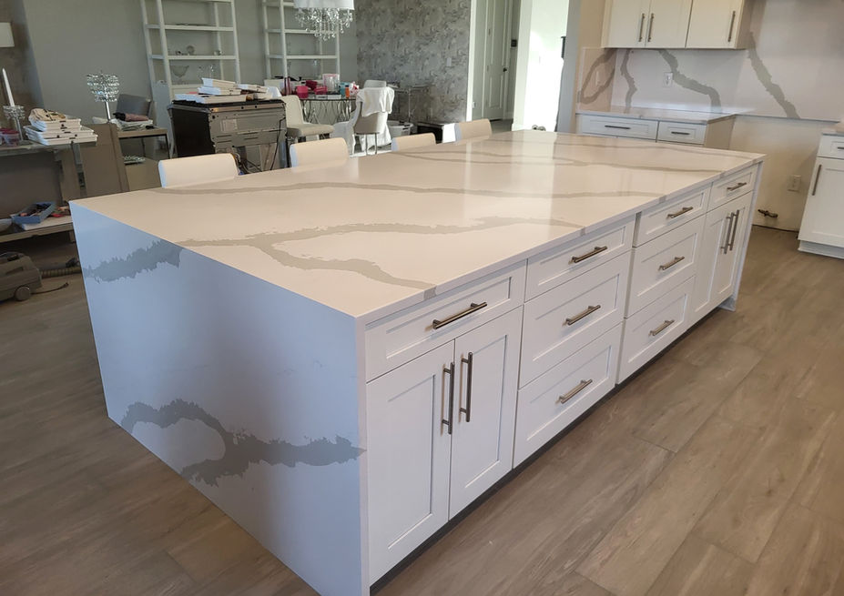 Large kitchen island with elegant white granite