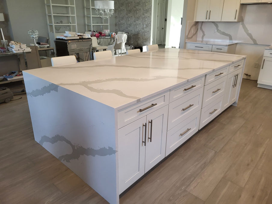 Large kitchen island with elegant white granite