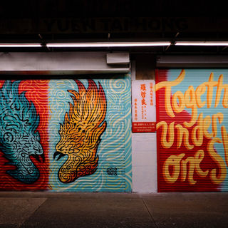 Adarna x Fenghuang mural by Mar Cortez in Vancouver Chinatown combining Filipino and Chinese mythological birds.