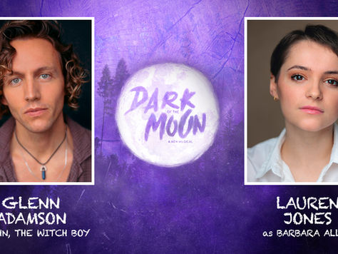 Purple painted words on a white moon against a brushstroked background read Dark Of The Moon with headshots of two caucasian actors, to the left a man with golden brown curls and a crystal around his neck, to the right an actress with short cropped brown hair and a white shirt