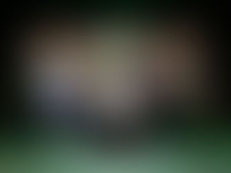 9 men of all different ages, ethnicities and characters dancing with drinks in a bar theatre set