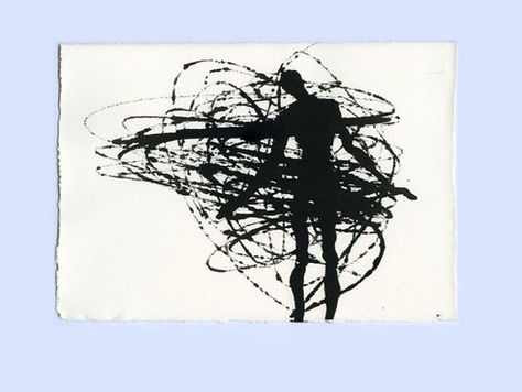 A white piece of paper on a pale blue background with a scribbled ink drawing of a figure