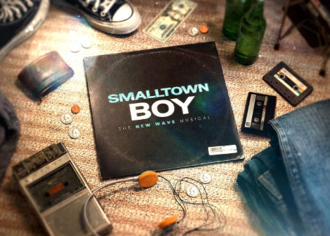 a record sleeve, cassettes, headphones and jeans on a bedroom floor