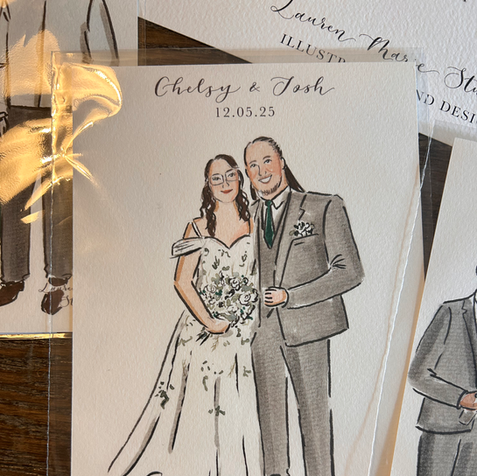 Bride and Groom illustrated portrait. The bride wears a white and green embroidered wedding dress, with brown hair and glasses. The man wears a grey suit with long brown hair.