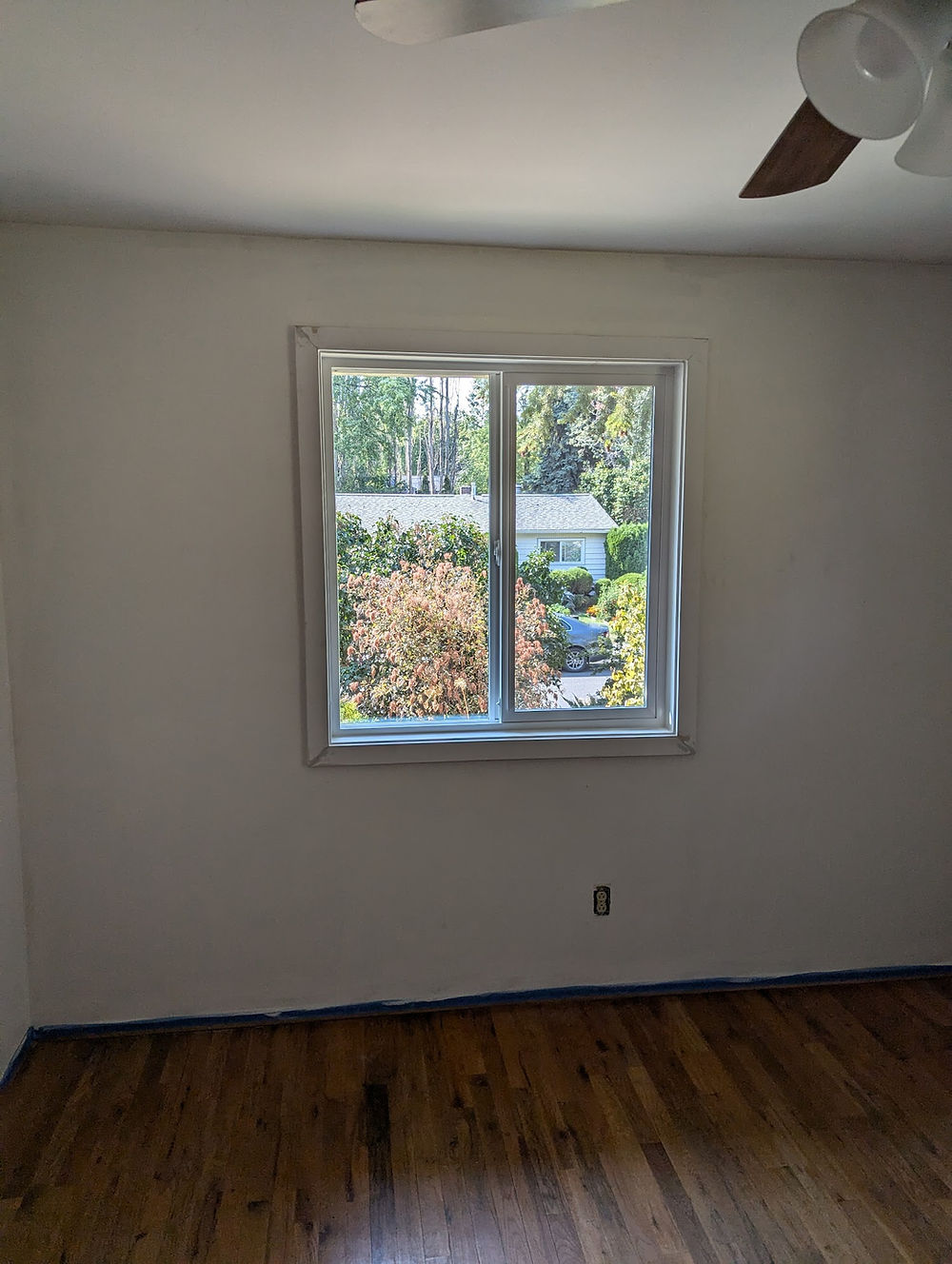 Bedroom window updated to meet egress, wood to vinyl