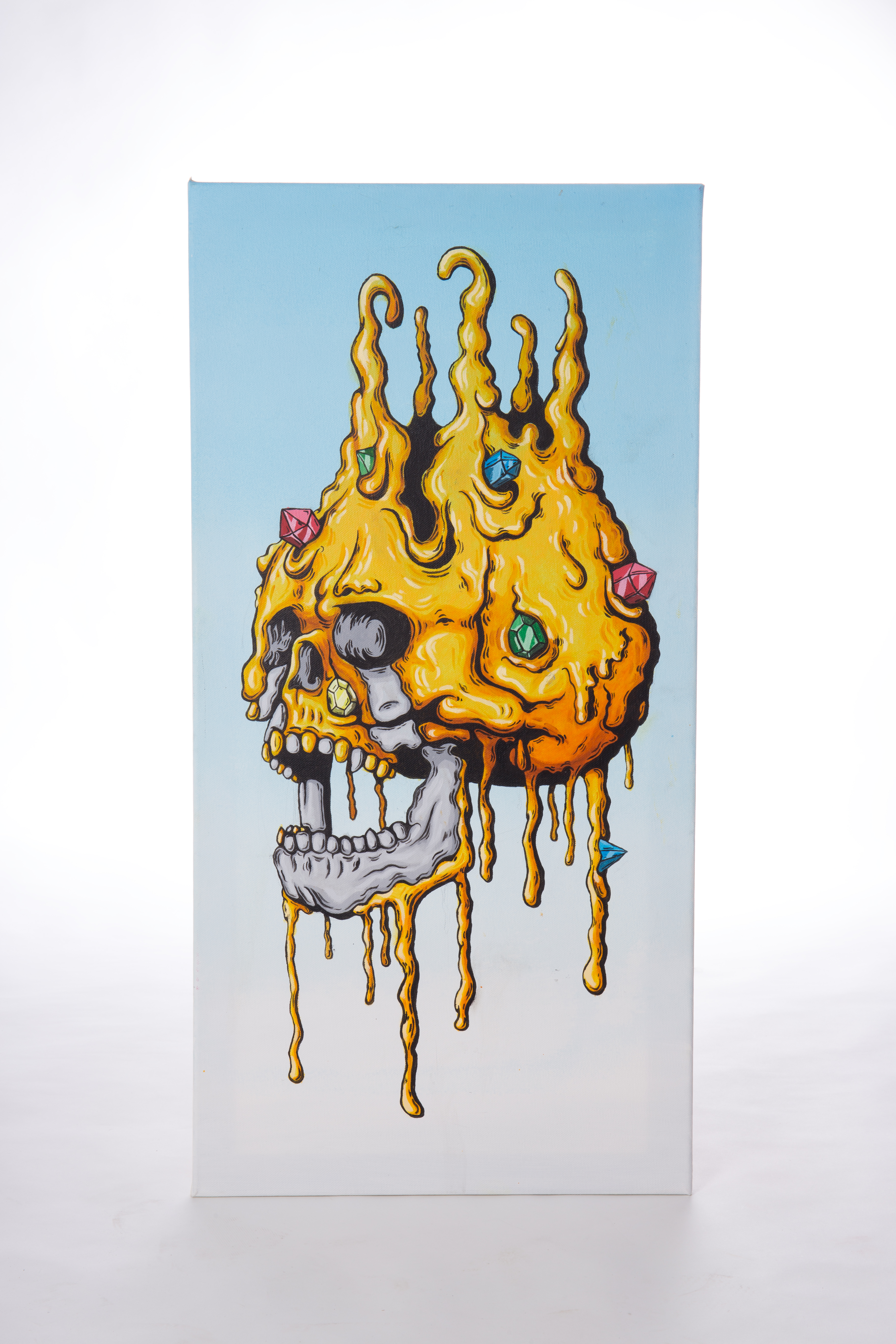 Melting golden skull