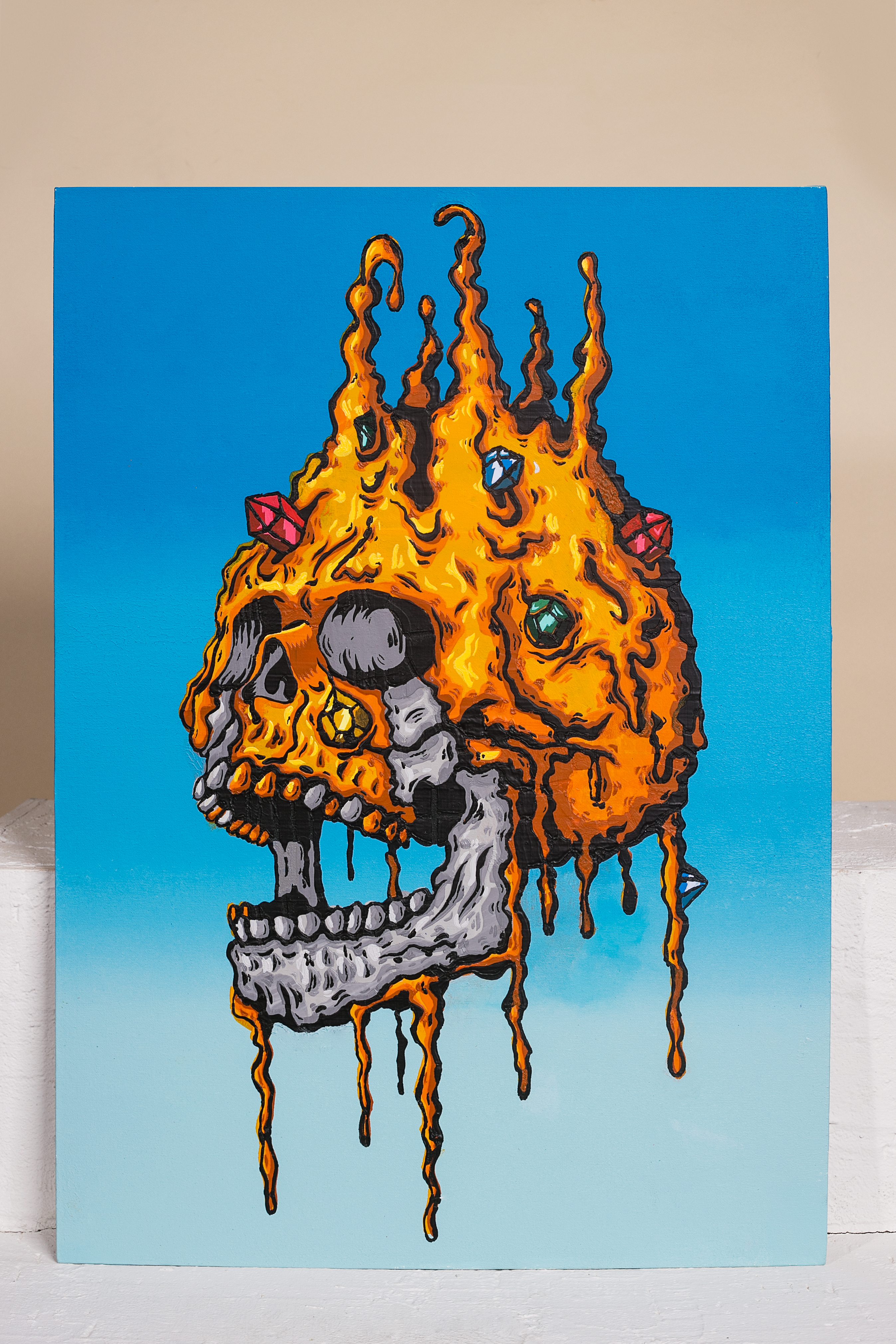 Melting golden skull
