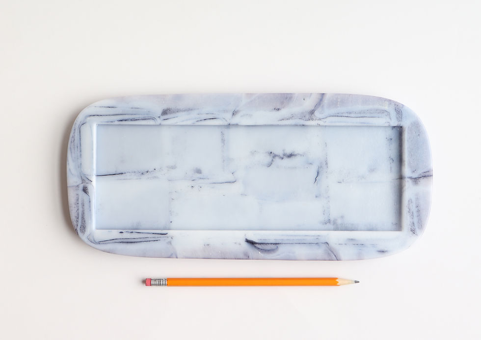 lavender colored fused glass art object with pencil for scale above