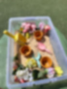 Spring Sensory Bin (edible sand made from crushed cheerios)
