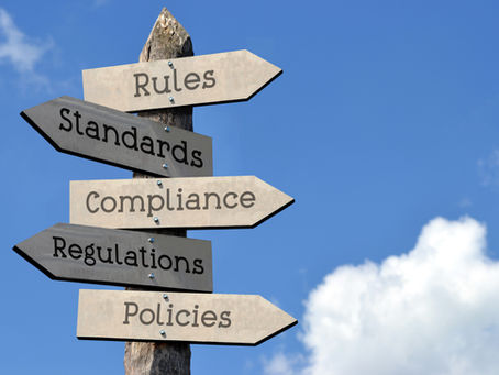 Compliance, regulation, policies, and rules a sign with clouds for HIPAA compliance and social media marketing