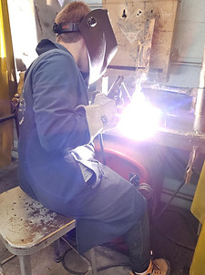 Student welding.
