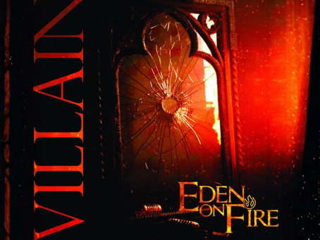 A broken mirror with a sunburst pattern reflects red light. Text reads "VILLAIN" and "EDEN ON FIRE" in bold, fiery letters.