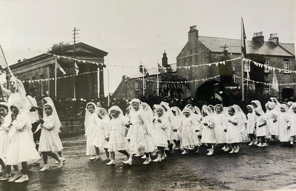 Corpus Christi procession circa 1955. Children from convent school with Miss Hill (right side). Image courtesy of Paul Barber.