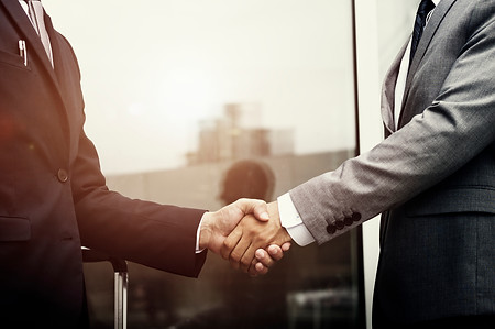 corporate-businessmen-shaking-hands copy