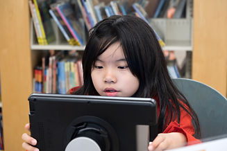 problemsolving kid-using-digital-tablet-