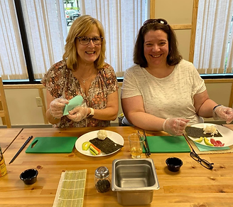 Chef guiding guests during a private sushi-making class by The Sushi Class in Connecticut