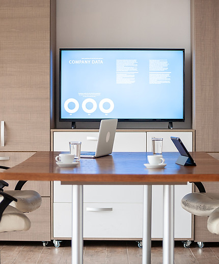 empty-business-meeting-conference-room-with-graphs-diagrams-tv-background.jpg