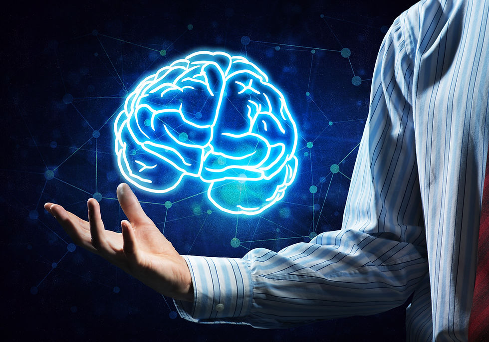 Man's hand holding image of brain