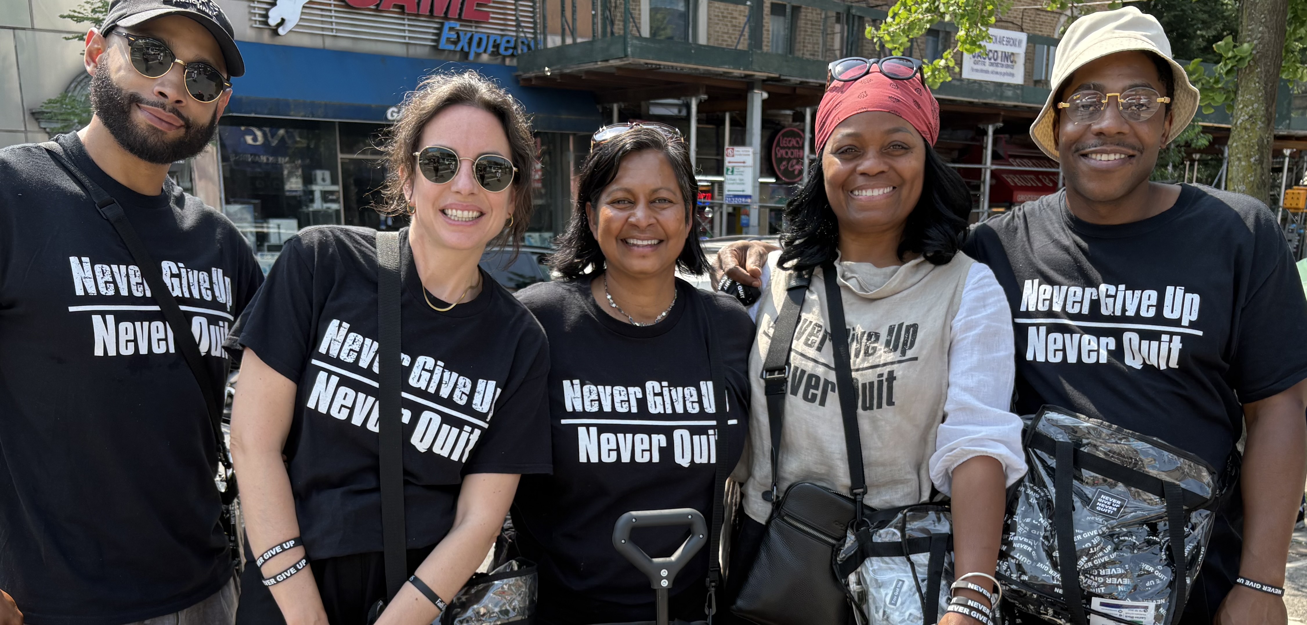 Five members of the Never Give Up Never Quit New York street team together outdoors