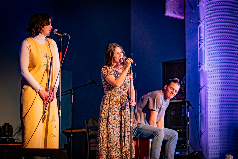 Photo of three musicians on stage