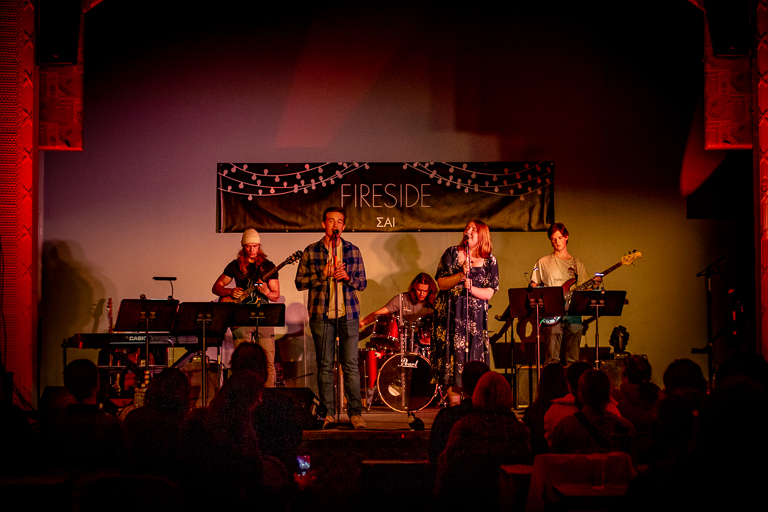 Photo of band playing on stage