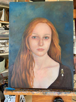 Oil painting of Ariane on easel
