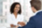 A woman and a man discussing corporate loans