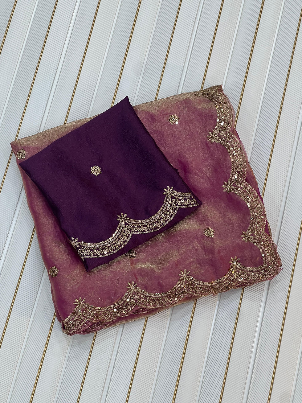 Dazzle at any celebration with this Heavy Space Silk Ready-to-Wear Saree, crafted in a soft, flowy fabric that combines elega