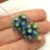 Thumbnail: Turquoise pair glass beads with raised dots 14mm
