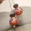 Thumbnail: Dark Orange pair lampwork glass bead 14mm