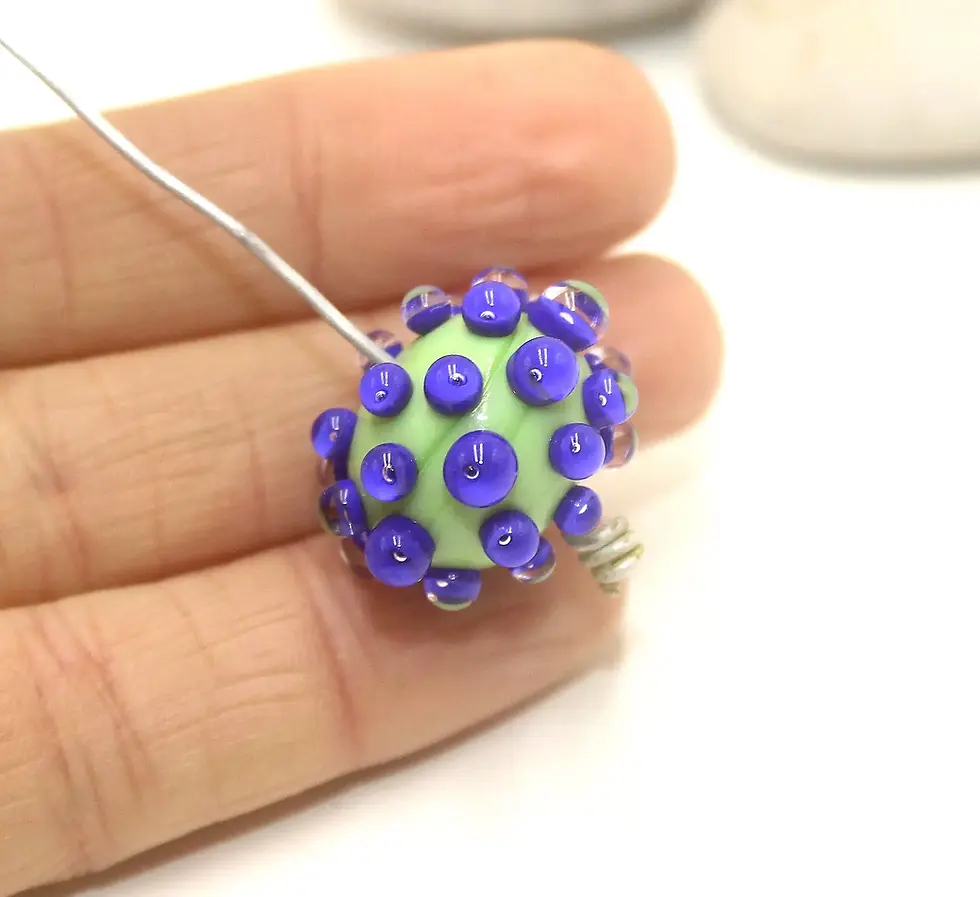Green glass bead with raised dots 15mm